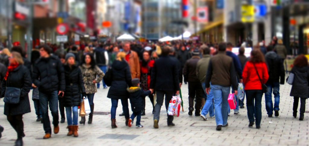 Shoppers walking on a pedestrian mall area