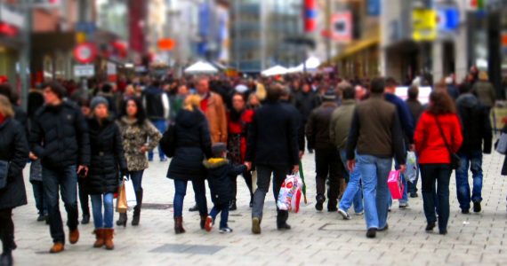 Shoppers walking on a pedestrian mall area