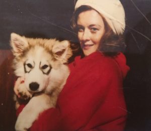 Photo of author holding her dog
